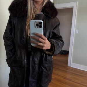 Stylish Black Leather Jacket with Fur Collar